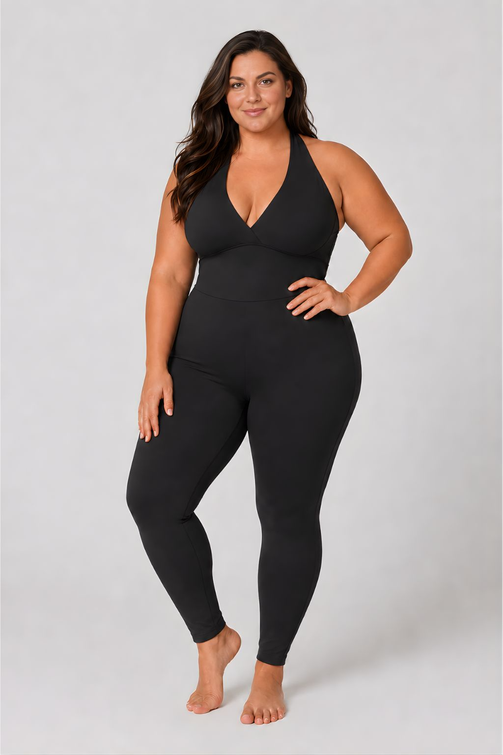 Woman wearing black DropTrou women's jumpsuit - extra large front studio view #Size_XL