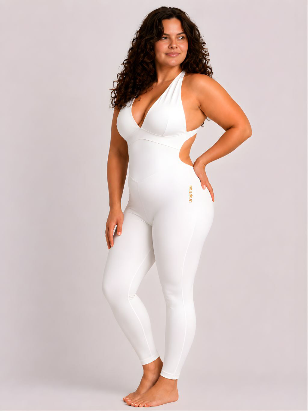 Woman wearing white DropTrou women's jumpsuit - large side studio view #Size_L