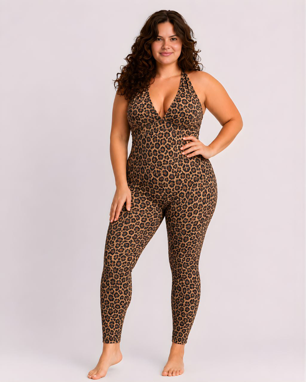 Woman wearing leopard DropTrou women's jumpsuit - large front studio view #Size_L
