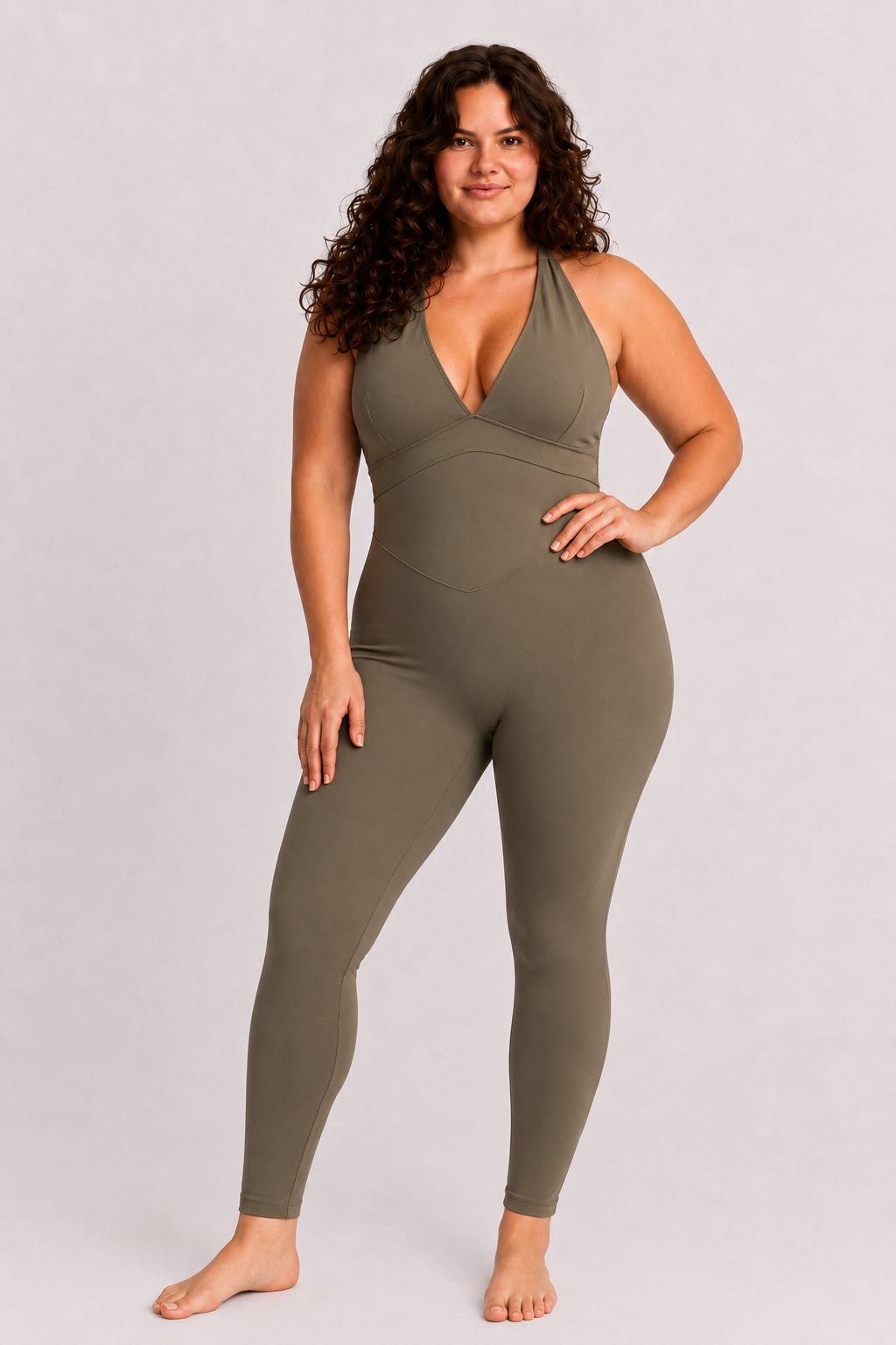Woman wearing olive DropTrou women's jumpsuit - large front studio view #Size_L