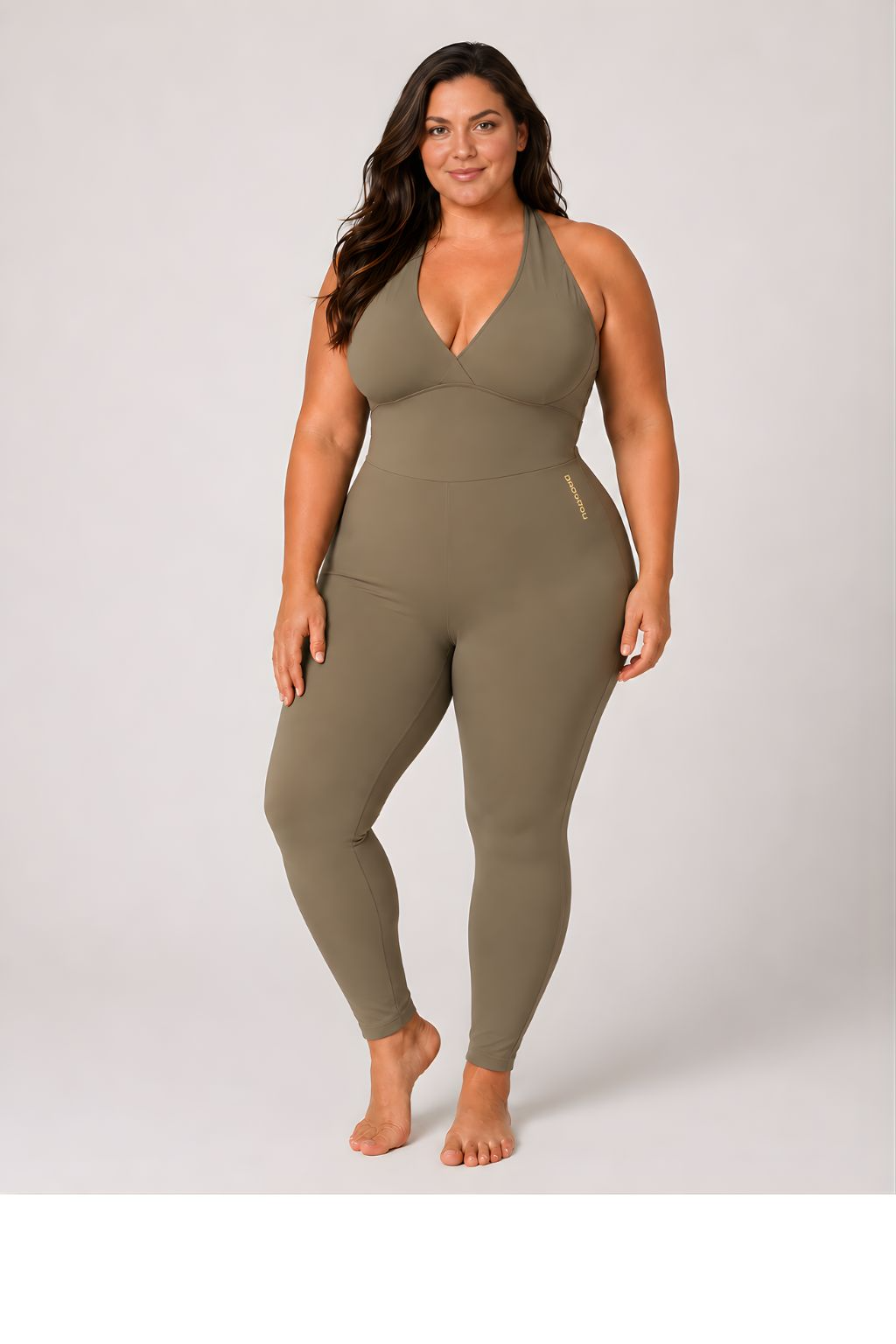 Woman wearing olive DropTrou women's jumpsuit - extra large front studio view #Size_XL