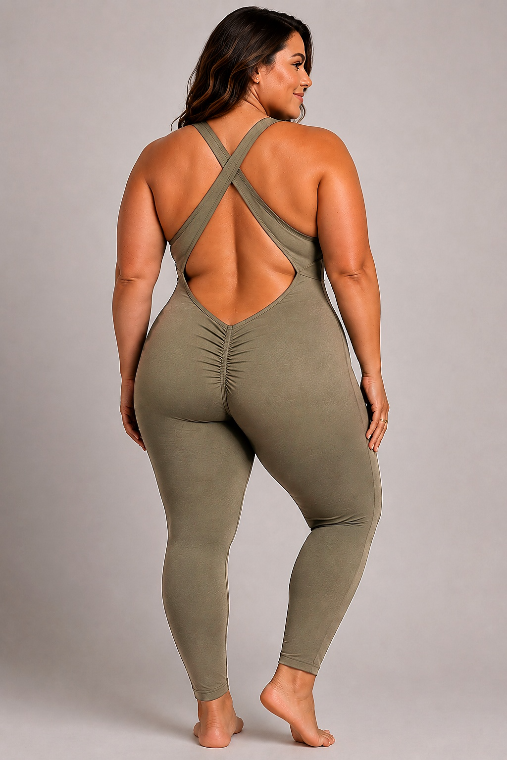 Woman wearing olive DropTrou women's jumpsuit - extra large back studio view #Size_XL