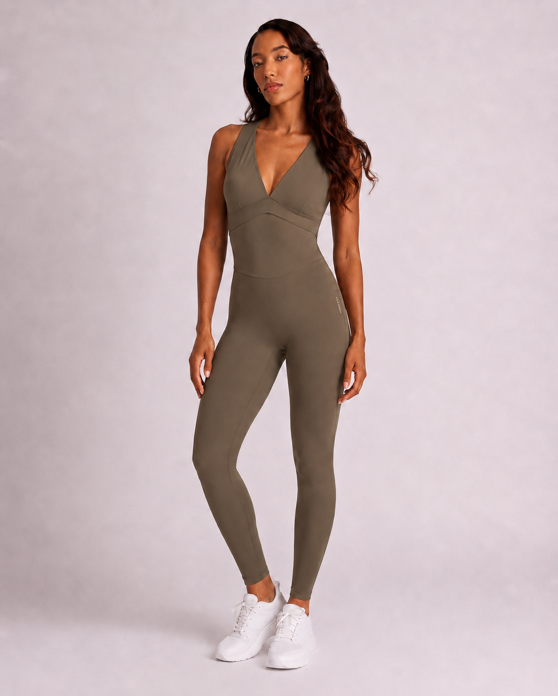 Woman wearing olive DropTrou women's jumpsuit - extra small front studio view #Size_XS