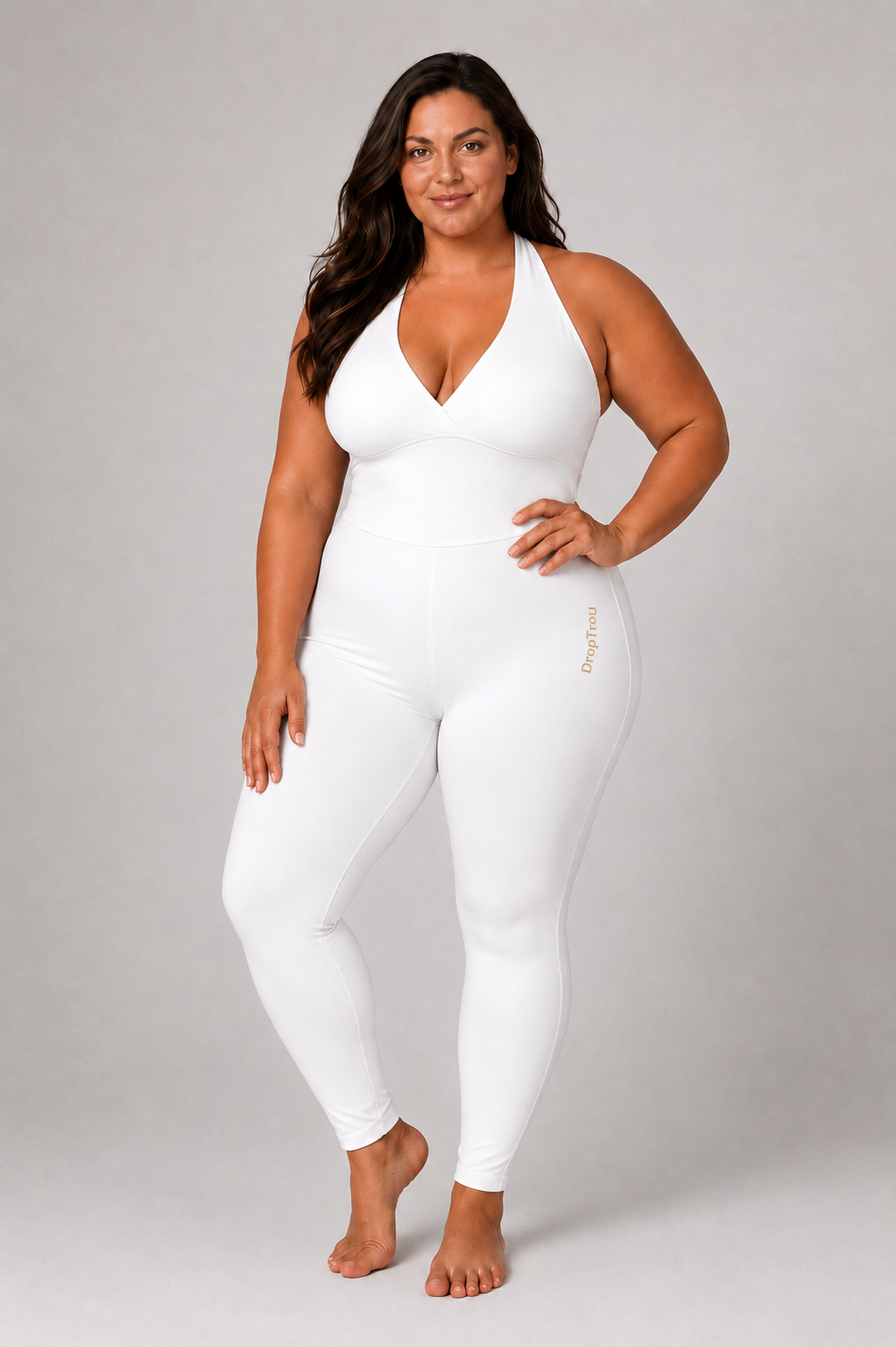 Woman wearing white DropTrou women's jumpsuit - extra large front studio view #Size_XL