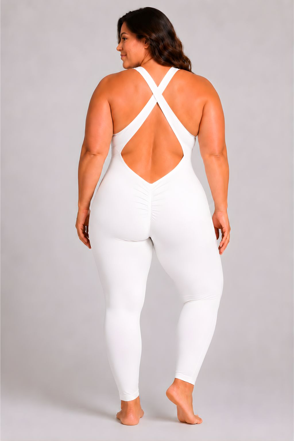 Woman wearing white DropTrou women's jumpsuit - extra large back studio view #Size_XL